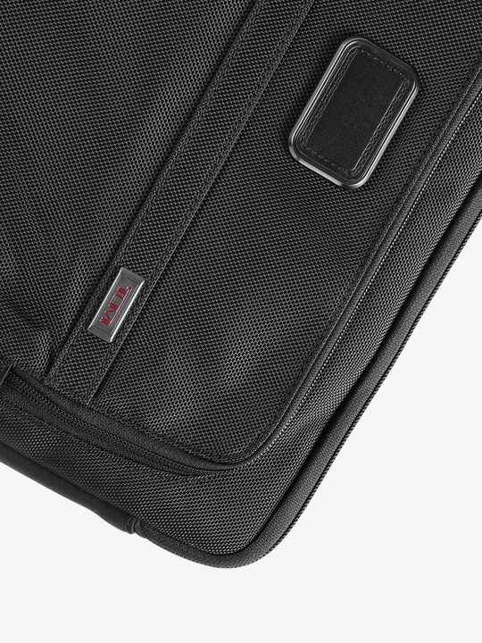 Close up of the black bag, showing texture of the nylon fabric