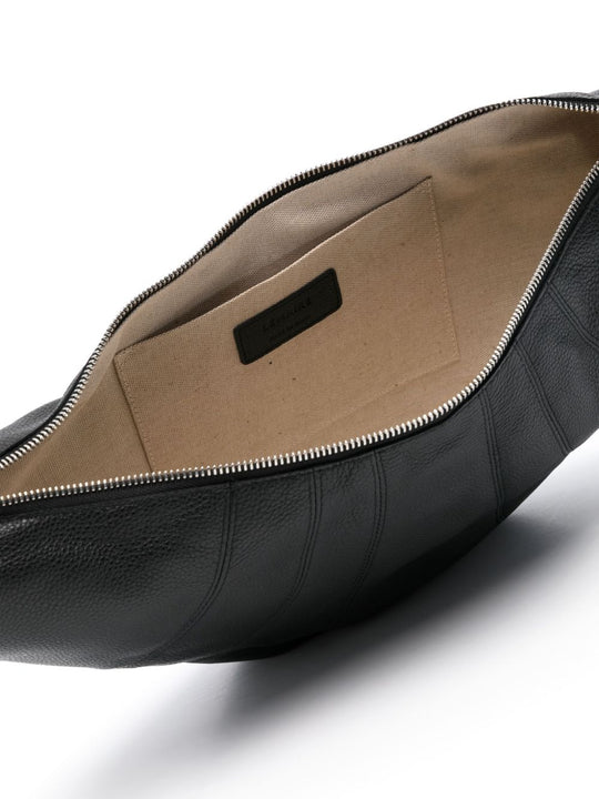 Close up of black bag, showing internal patch pocket