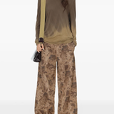 Green top, full body view