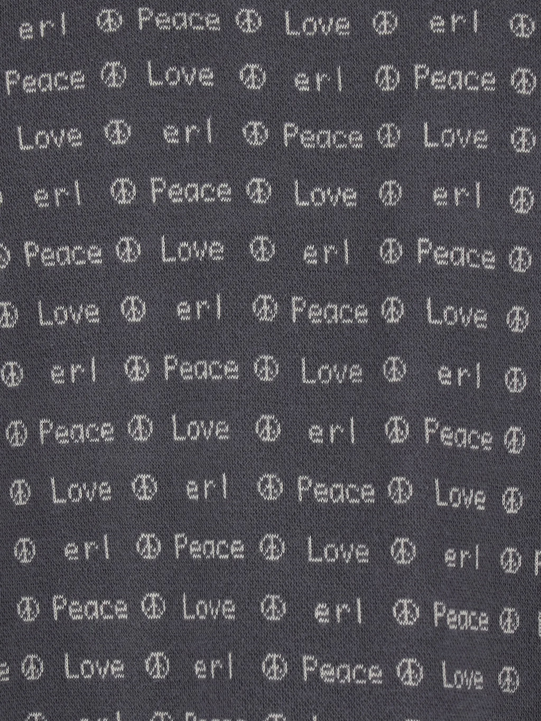 Close up of brown shirt, showing texture of the cotton fabric