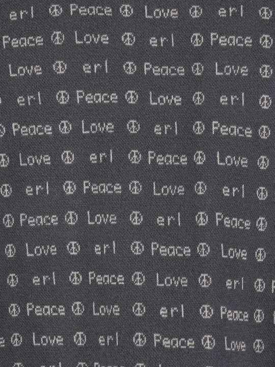 Close up of brown shirt, showing texture of the cotton fabric