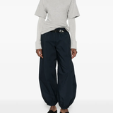 Blue pants, full body view