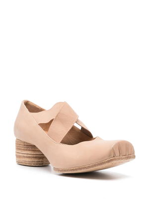 Beige ballet shoes, side view