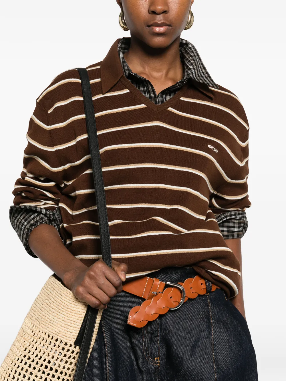 Brown shirt worn by a person, showing the shirt's fit