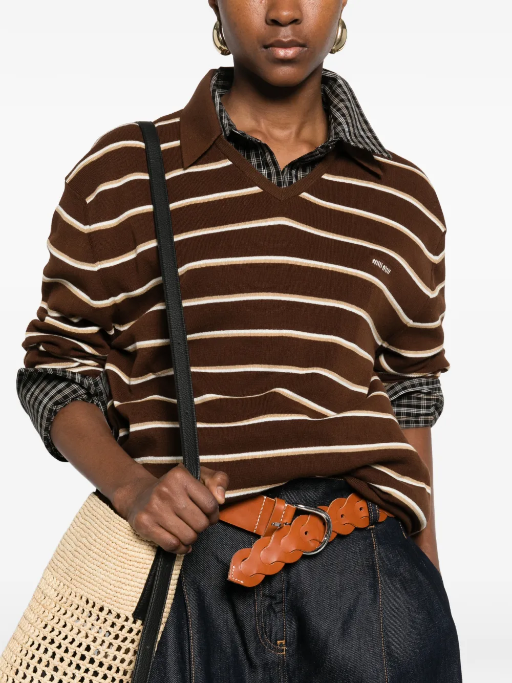 Brown shirt worn by a person, showing the shirt's fit