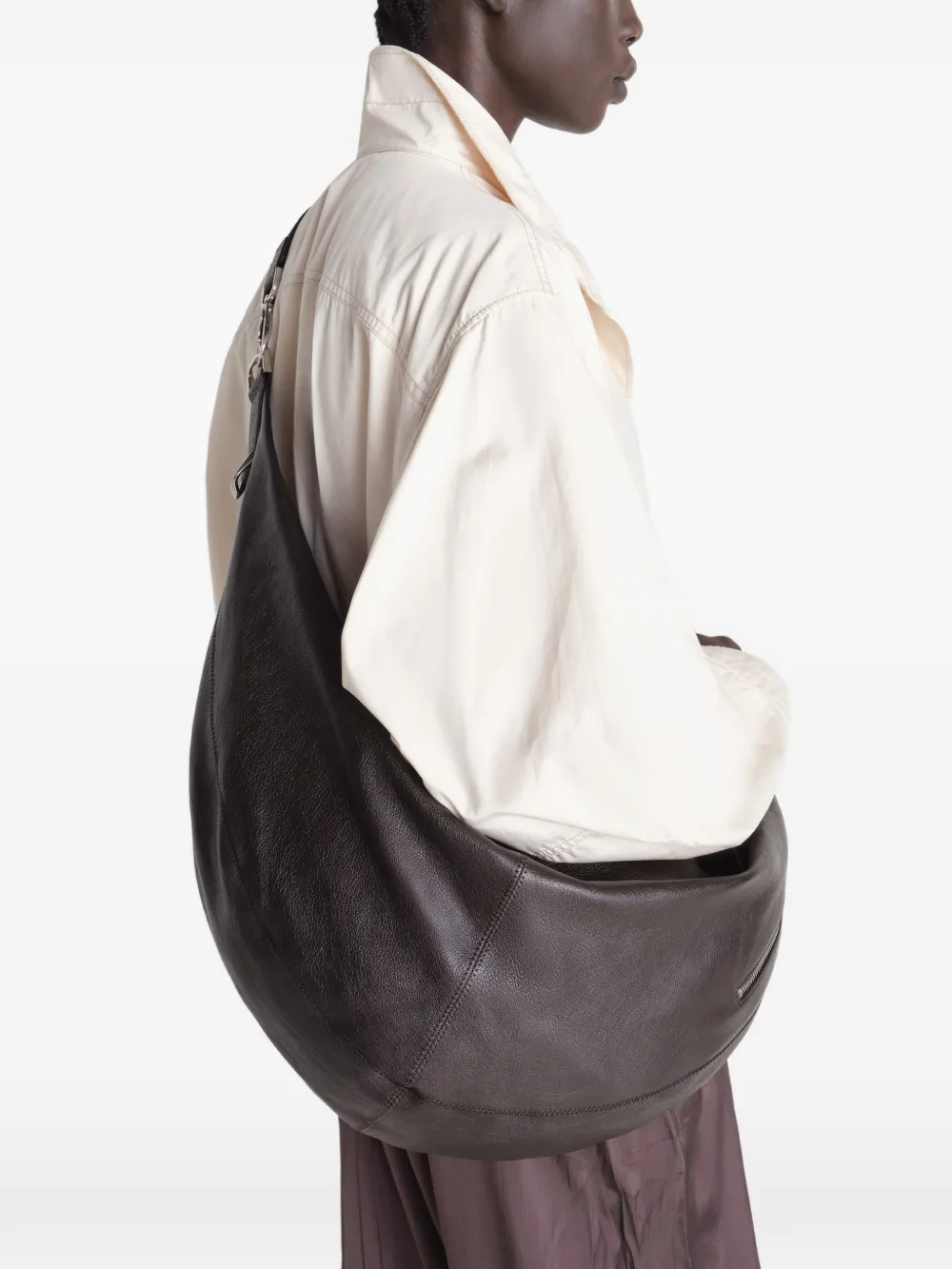 Brown bag worn by a person, showing the bag's fit