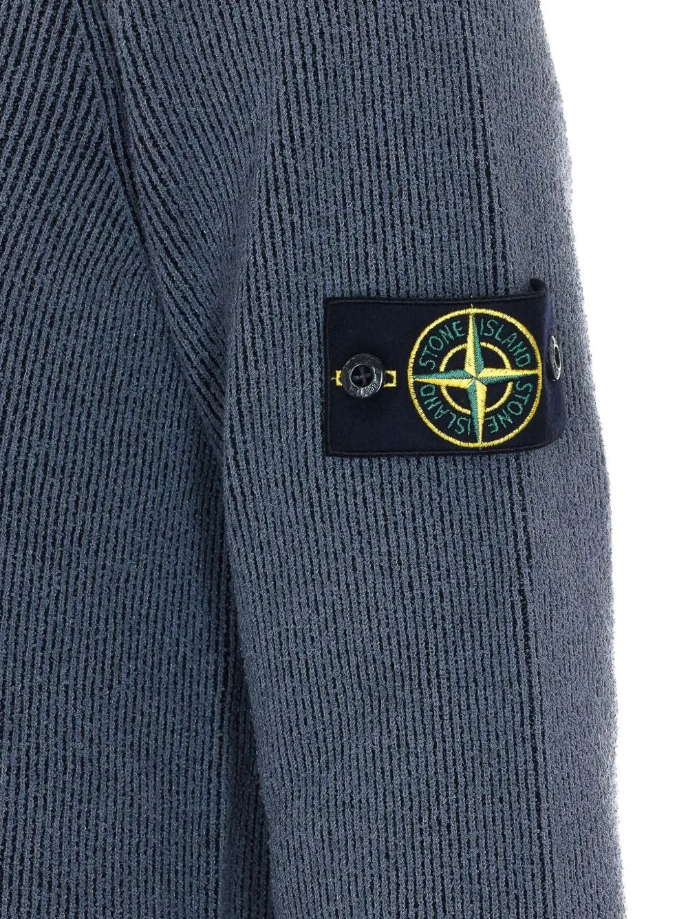 Close up of grey sweashirt, showing texture of the polyamide and cotton and elastane fabric