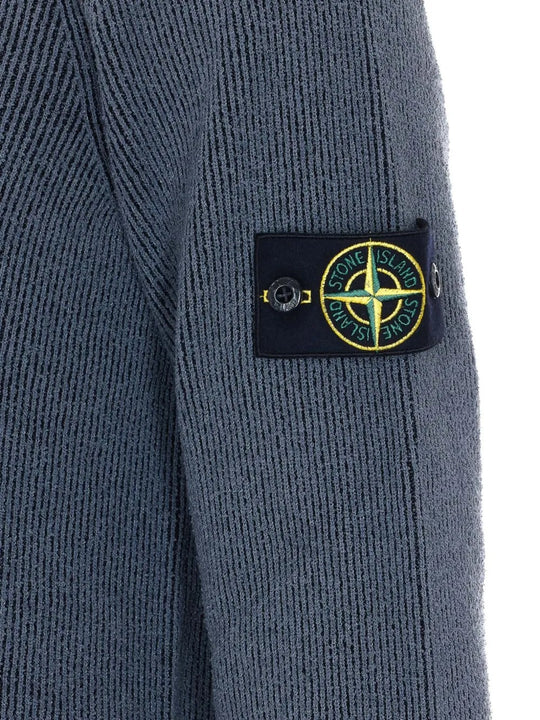 Close up of grey sweashirt, showing texture of the polyamide and cotton and elastane fabric