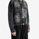 Black jacket worn by a person, showing the jacket fit
