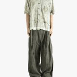 Green shirt, full body view