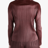 Burgundy shirt worn by a person, showing the shirt fit