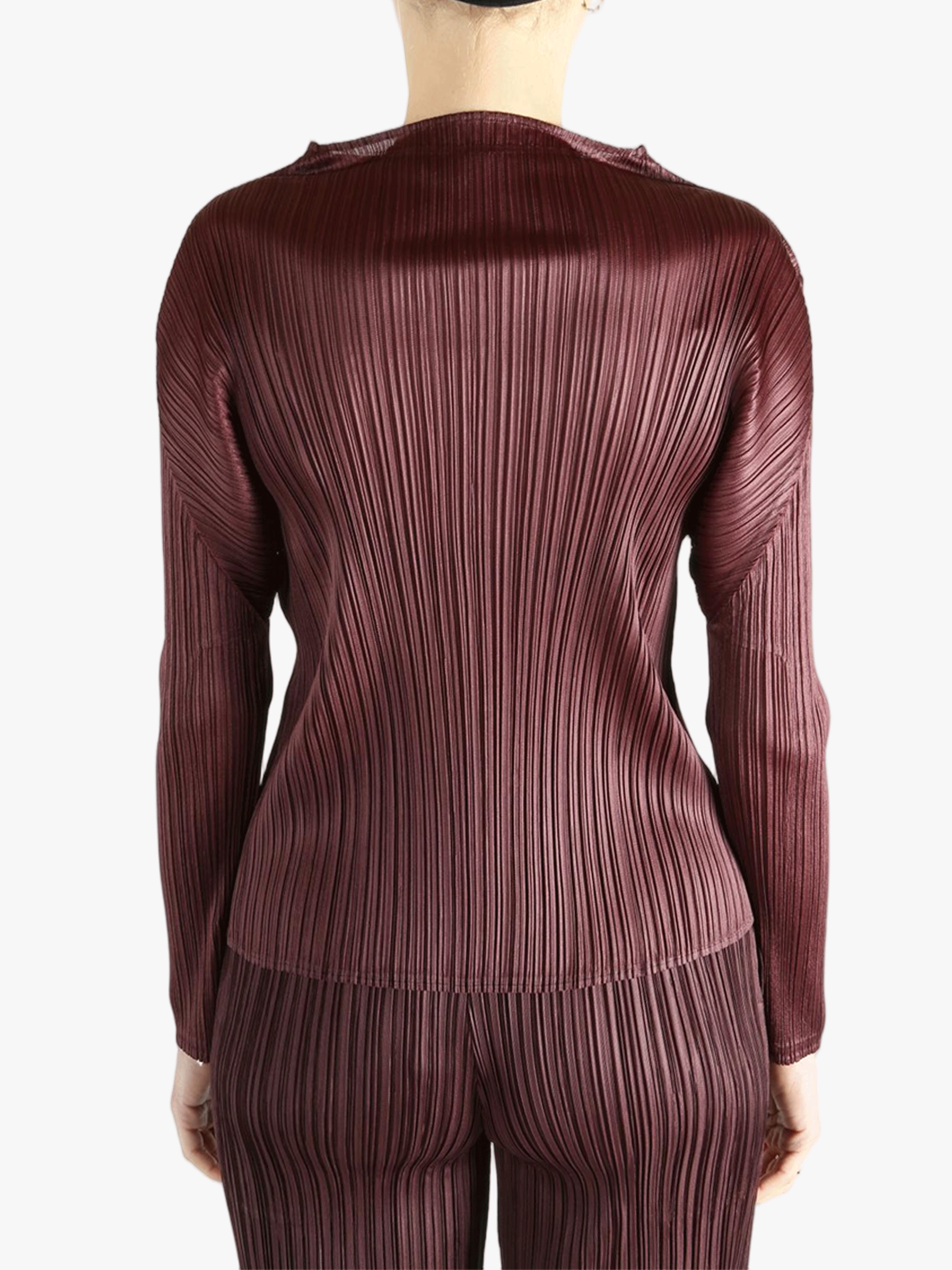 Burgundy shirt worn by a person, showing the shirt fit