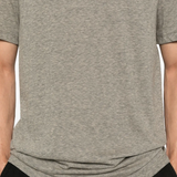 Close up of the grey t-shirt, showing texture of the cotton and polyester fabric