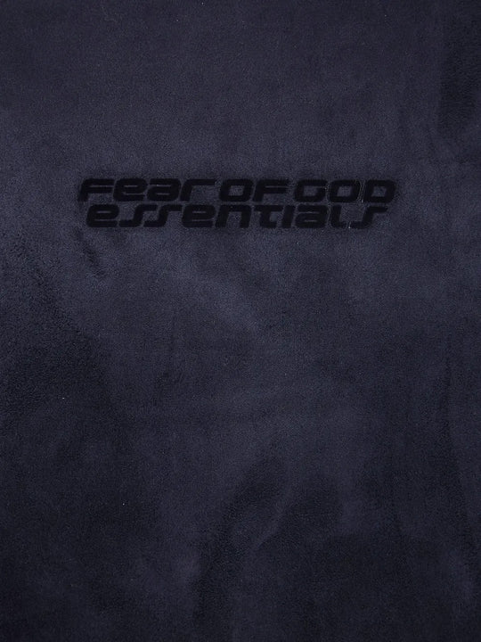 Close up of blue hoodie, showing texture of the fabric