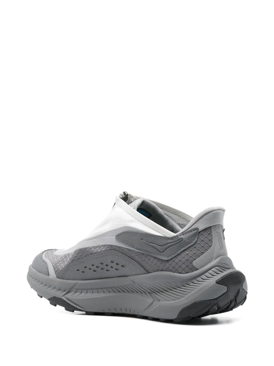 Grey sneakers, back view