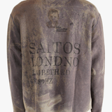 Brown top worn by a person, showing the top fit