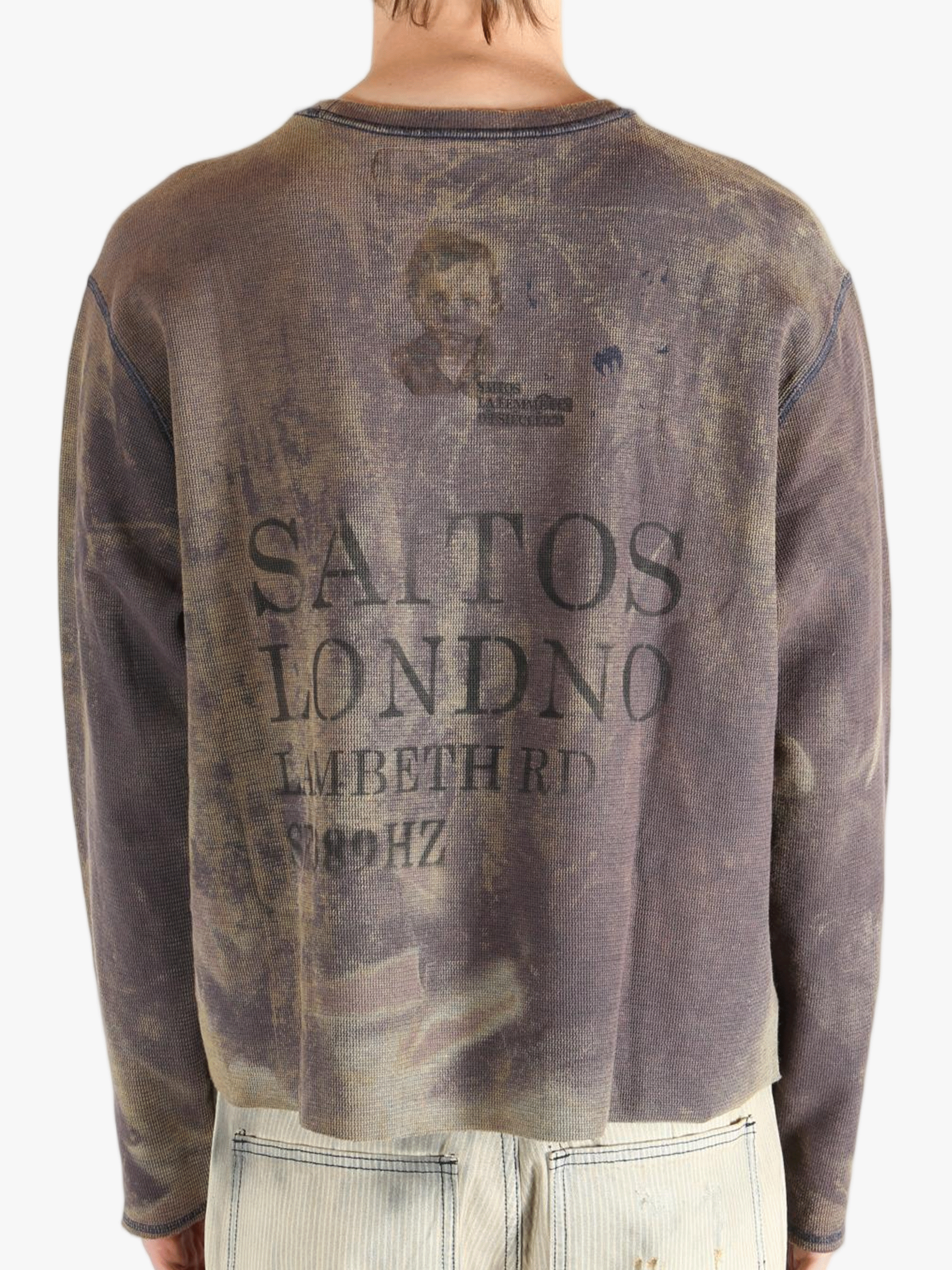 Brown top worn by a person, showing the top fit