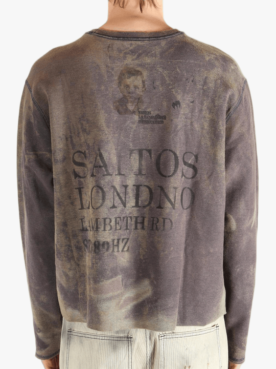 Brown top worn by a person, showing the top fit
