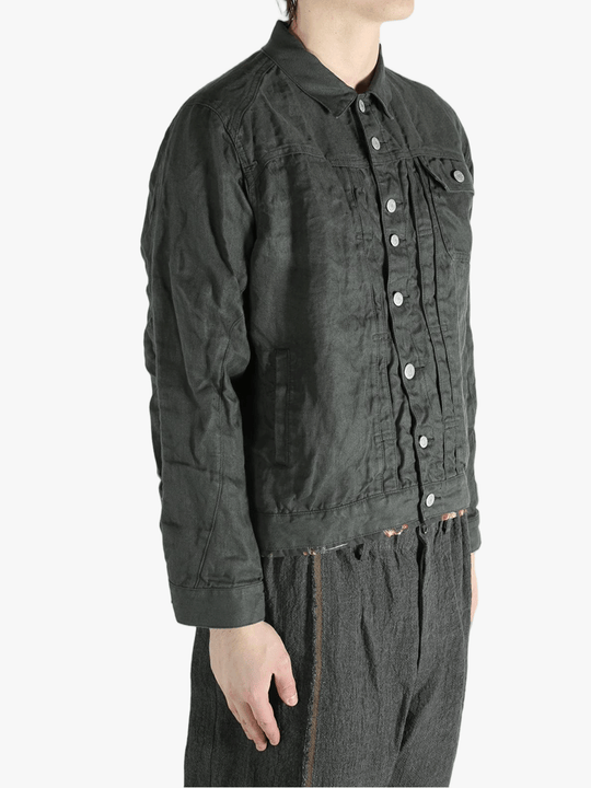 Black jacket worn by a person, showing the jacket's fit