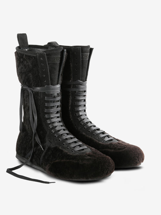 Brown boots, side view