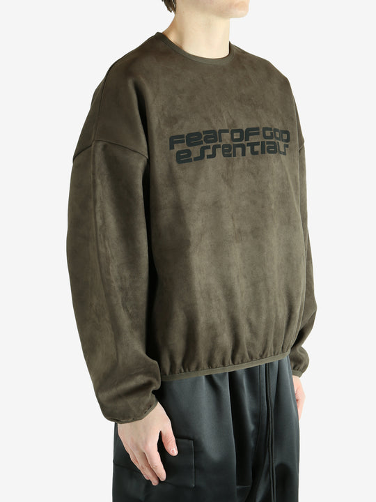 Brown sweatshirt worn by a person, showing the sweatshirt's fit