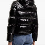 Black jacket worn by a person, showing the jacket fit