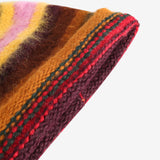 Close up of brown hats, showing texture of the fabric