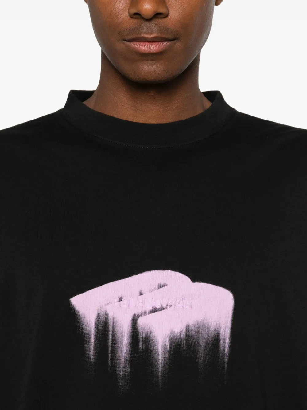 Close up of black T-shirt , showing texture of the cotton fabric