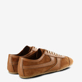 Tan sneakers, back view