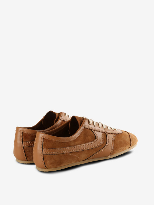 Tan sneakers, back view