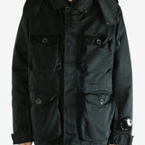 Black jacket worn by a person, showing the jacket's fit