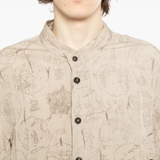 Close up of tan shirt,showing texture of the cotton fabric