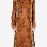 Orange coat worn by a person, showing the coat’s fit