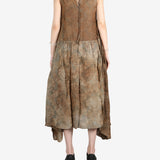 Brown dress worn by a person, showing the dress's fit