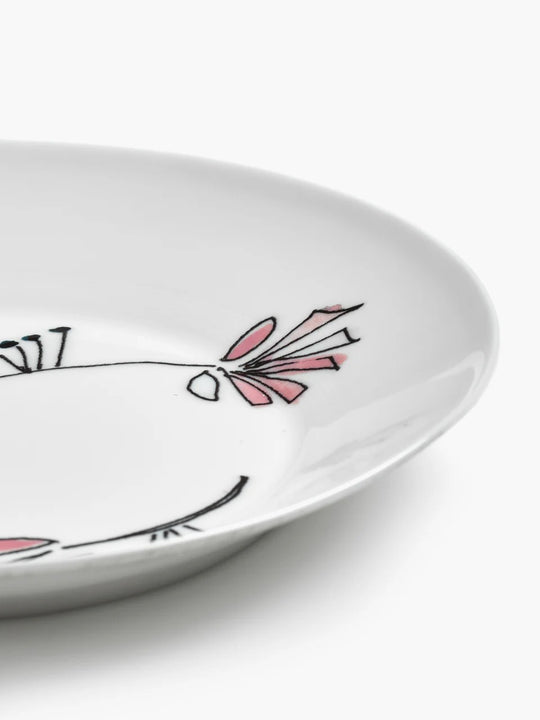 Close up of pink plate, showing texture of the bone porcelain fabric