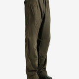 Green pants worn by a person, showing the pants fit