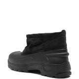 Black boots, back view