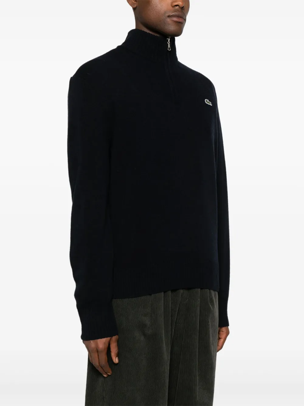 Navy hoddie worn by a person, showing the hoddie's fit