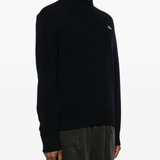 Navy hoddie worn by a person, showing the hoddie's fit