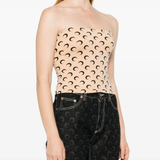 Tan tops worn by a person, showing the tan tops' fit