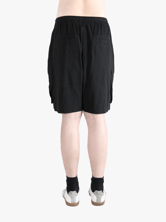 Black shorts worn by a person, showing the shorts fit