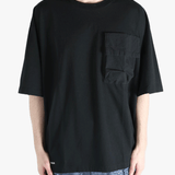 Black t-shirt worn by a person, showing the shirt's fit