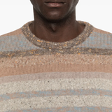 Close up of brown sweater, showing the detail of woll fabric