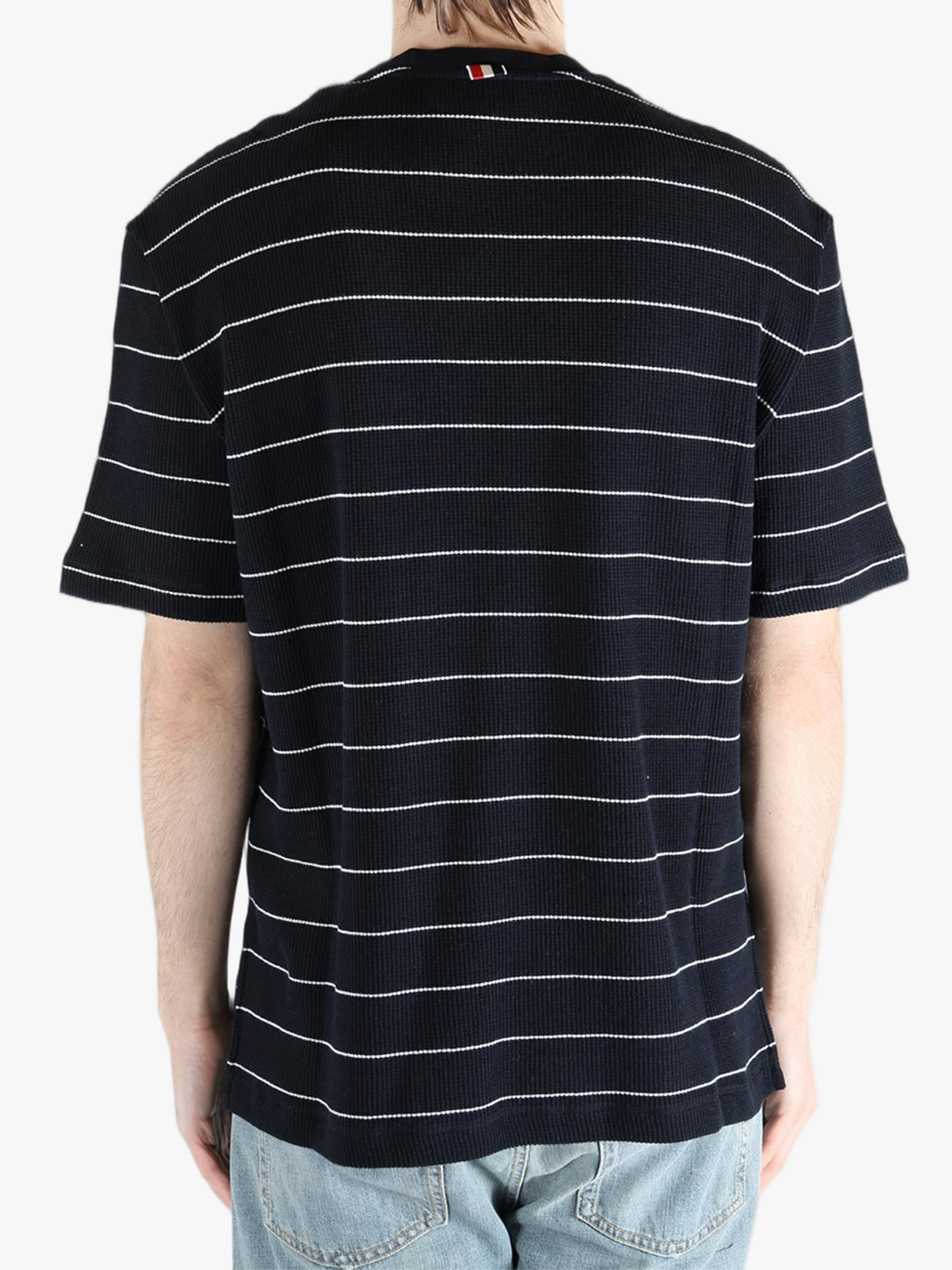 Navy t-shirt worn by a person, showing the t-shirt fit