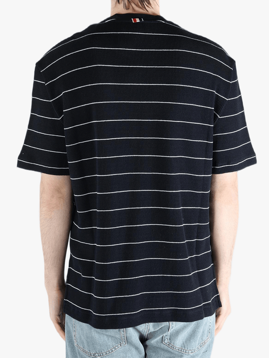 Navy t-shirt worn by a person, showing the t-shirt fit