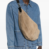 brown  bags worn by a person, showing the bags fit