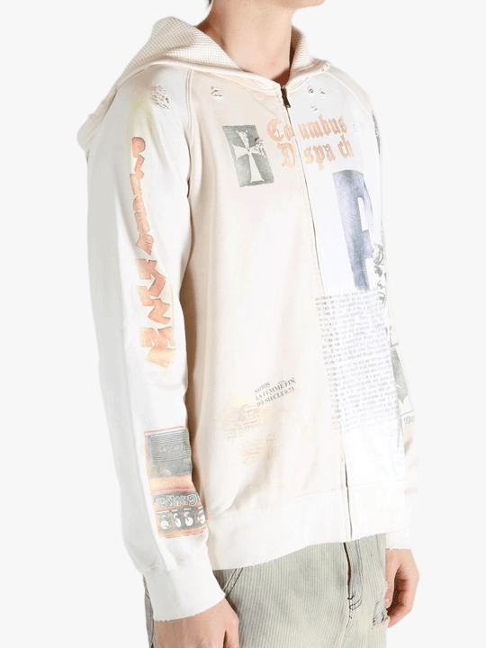 White hoodie worn by a person, showing the hoodie's fit