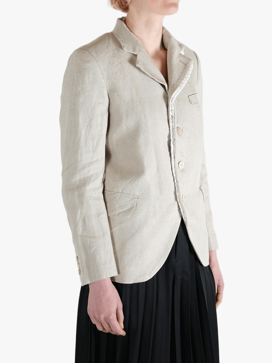 White jacket worn by a person, showing the white jacket fit