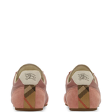 Pink sneakers, back view
