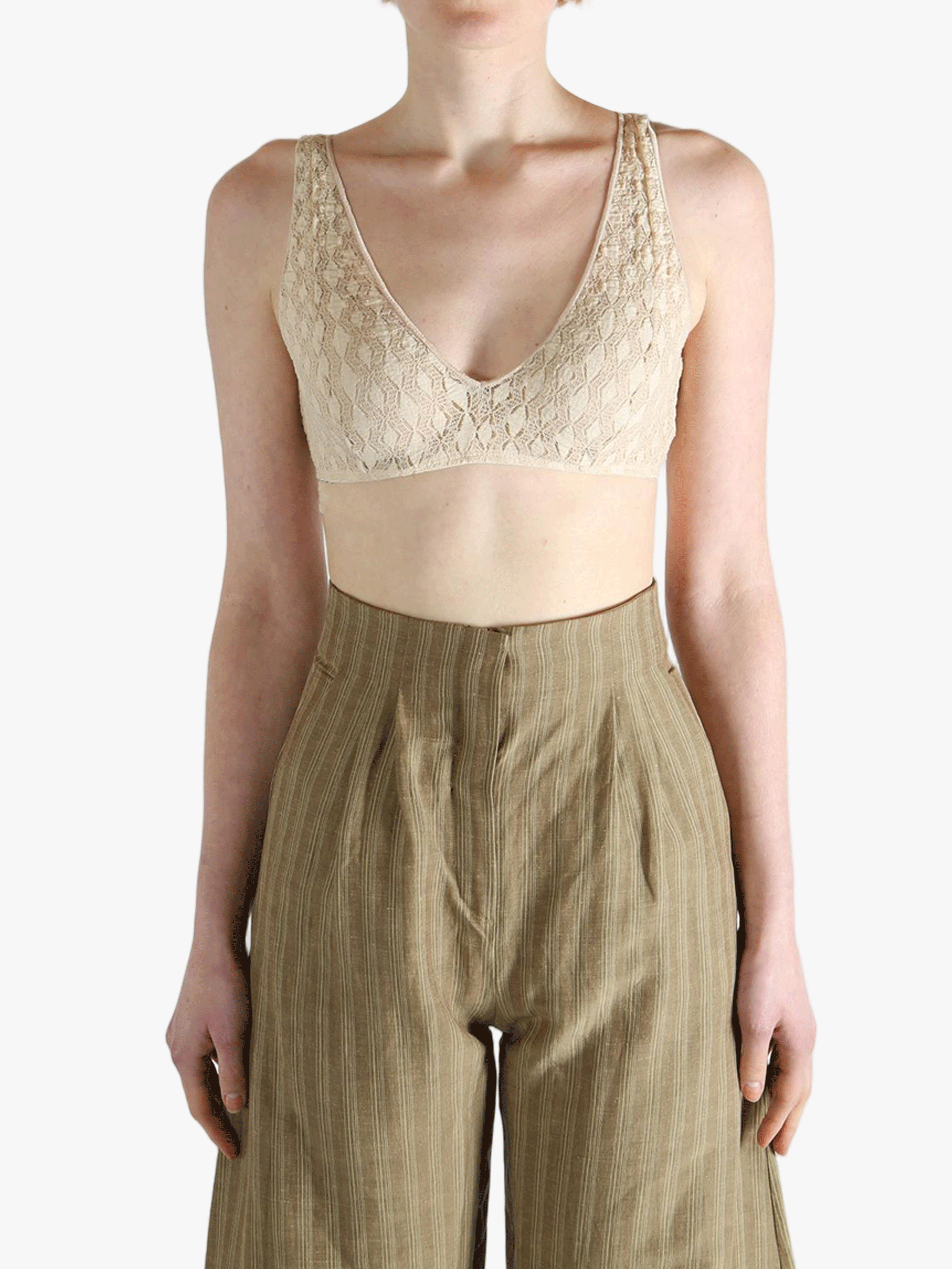 Tan bra worn by a person, showing the bra's fit